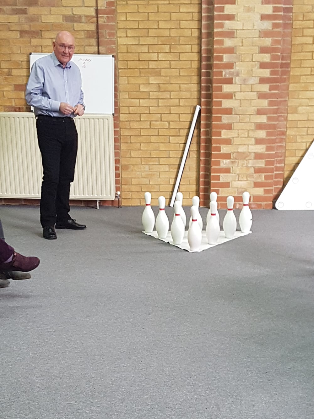 Service users playing bowling