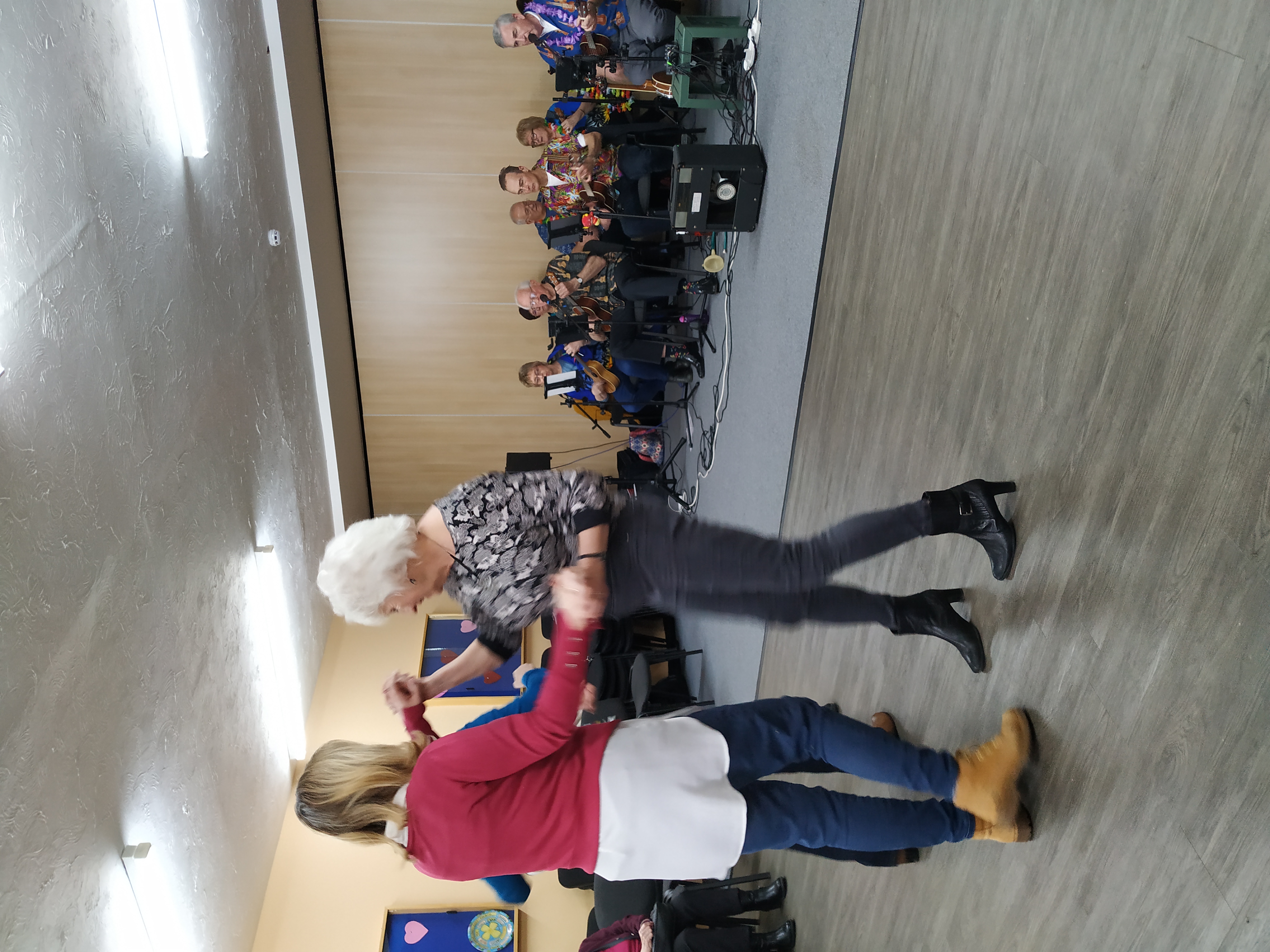 A band playing for phoenix day centre members
