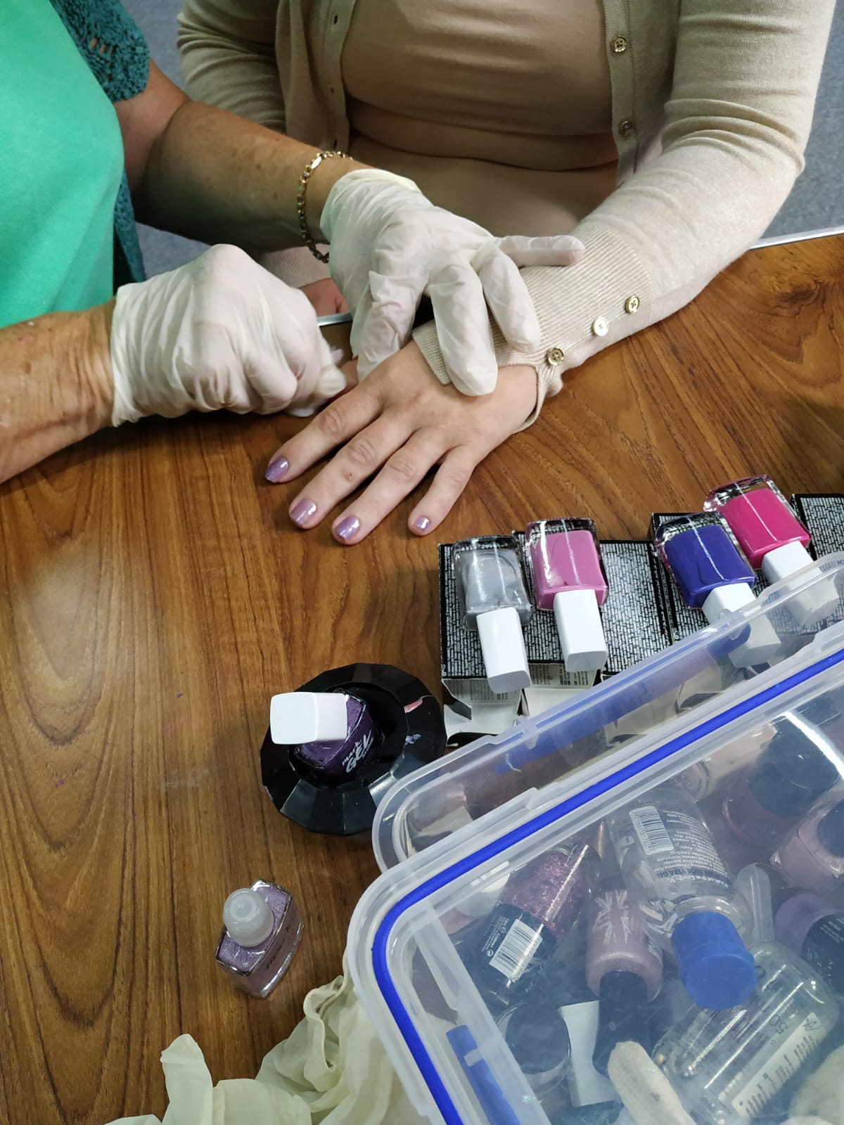 Service User having a manicure